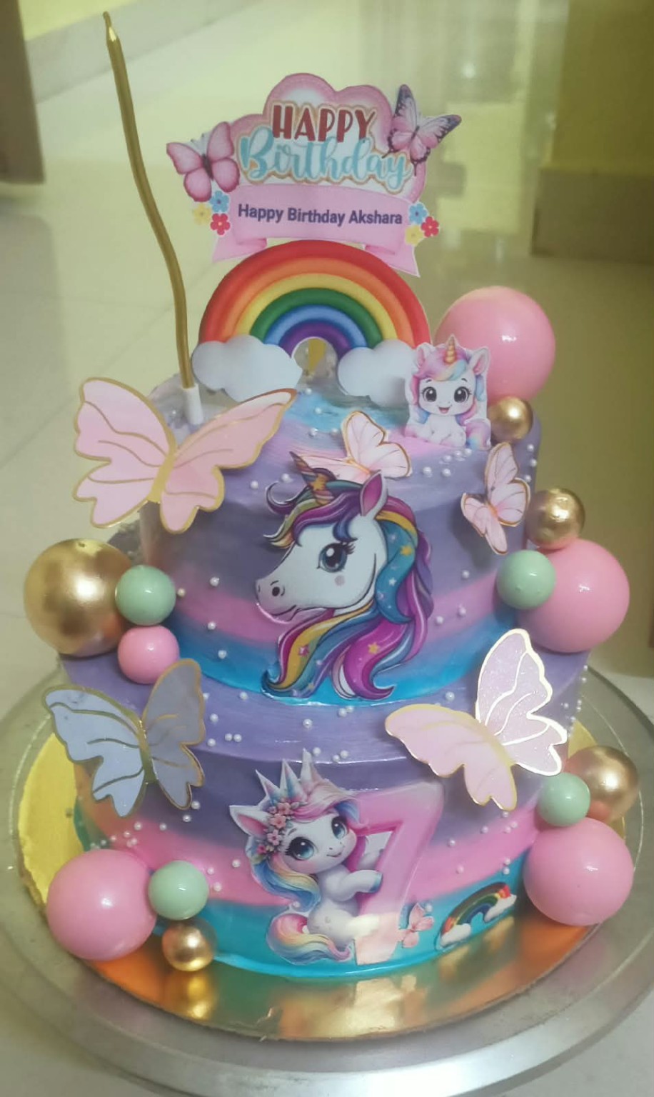 Pastel unicorn themed birthday cake